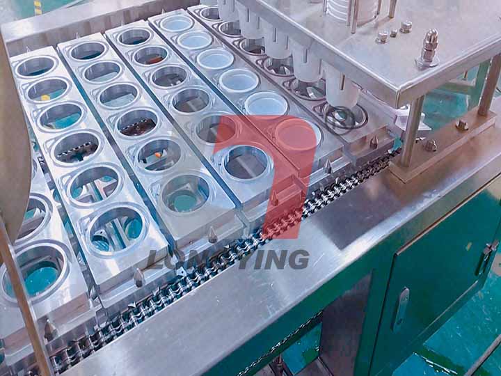 龍應(yīng)甜面醬全自動(dòng)灌裝封口機(jī) 龍應(yīng)甜面醬全自動(dòng)灌裝封口機(jī)