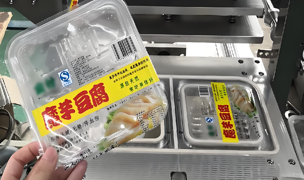 龍應(yīng)魔芋豆腐全自動(dòng)灌裝封口機(jī)